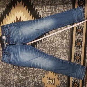 Buckle black skinny jeans